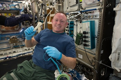 Astronauts 3D print tools