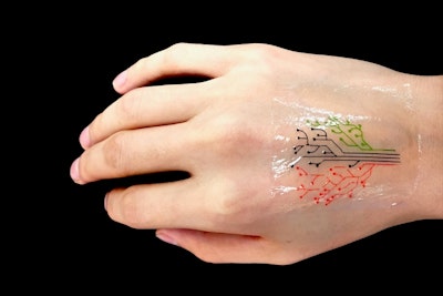 Engineers 3-D print a "living tattoo"