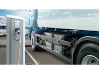 Electric truck batteries are charged from the charging station. Concept