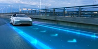 Autonomous Self-Driving 3D Car Moving Through City Highway. VFX Visualization Concept: Software Sensor Scanning Road Ahead for Vehicles, Danger, Speed Limits. Day Urban Driveway. Front Following View
