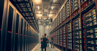 A large warehouse contains large, modern computing units on the left and small, stacked ones on the right. There is an aisle running through the centre.